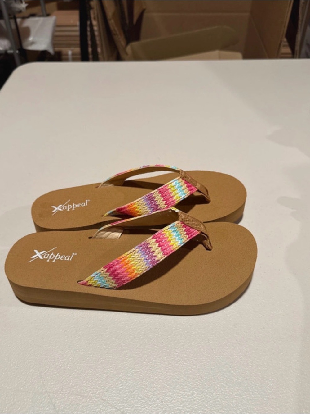 Xappeal Women’s Rainbow Woven Strap Tan Flip Flops